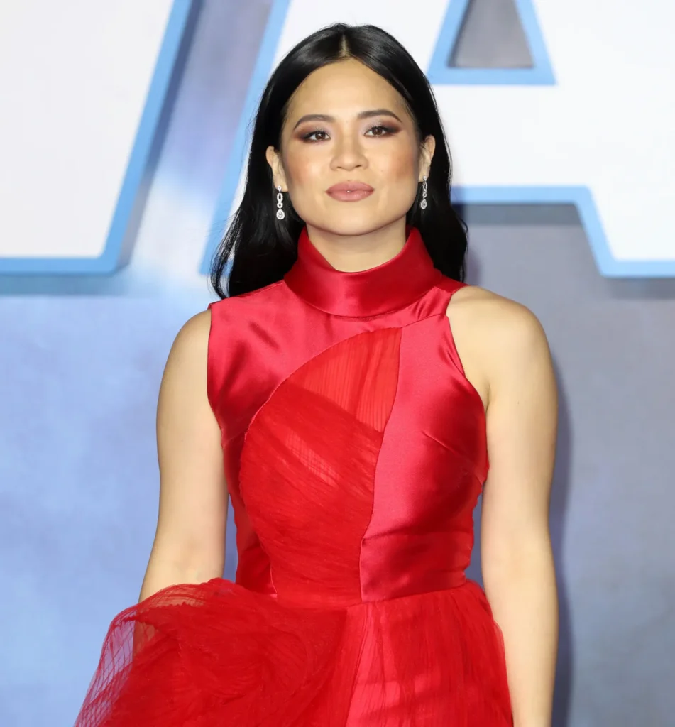Kelly Marie Tran height is 5 feet 2 inches (1.57 m) and weight is 55 kilograms (121 lbs). 